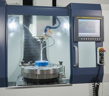 A high-tech CNC machine carving a snus can