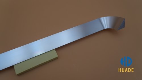 High-precision aluminum compression driver parts including housing, flange, and venting channels, ready for assembly.
