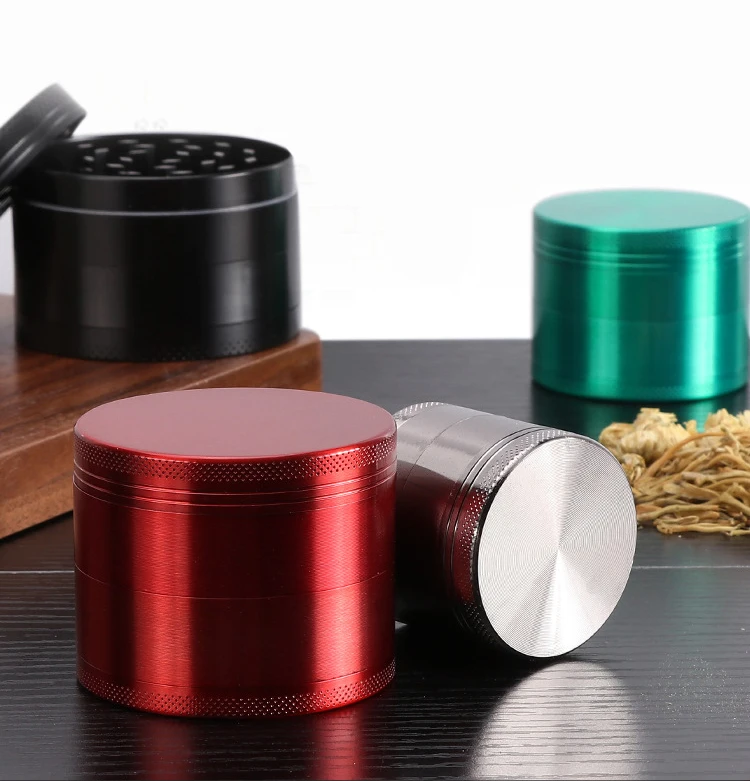 Premium anodized aluminum herb grinders Premium anodized aluminum herb grinders in red, silver, and green finishes, manufactured by Dongguan Huade Precision.