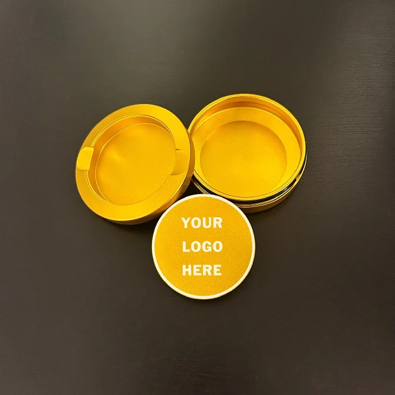 Close-up of a matte black CNC machined snus can with a smooth surface finish.